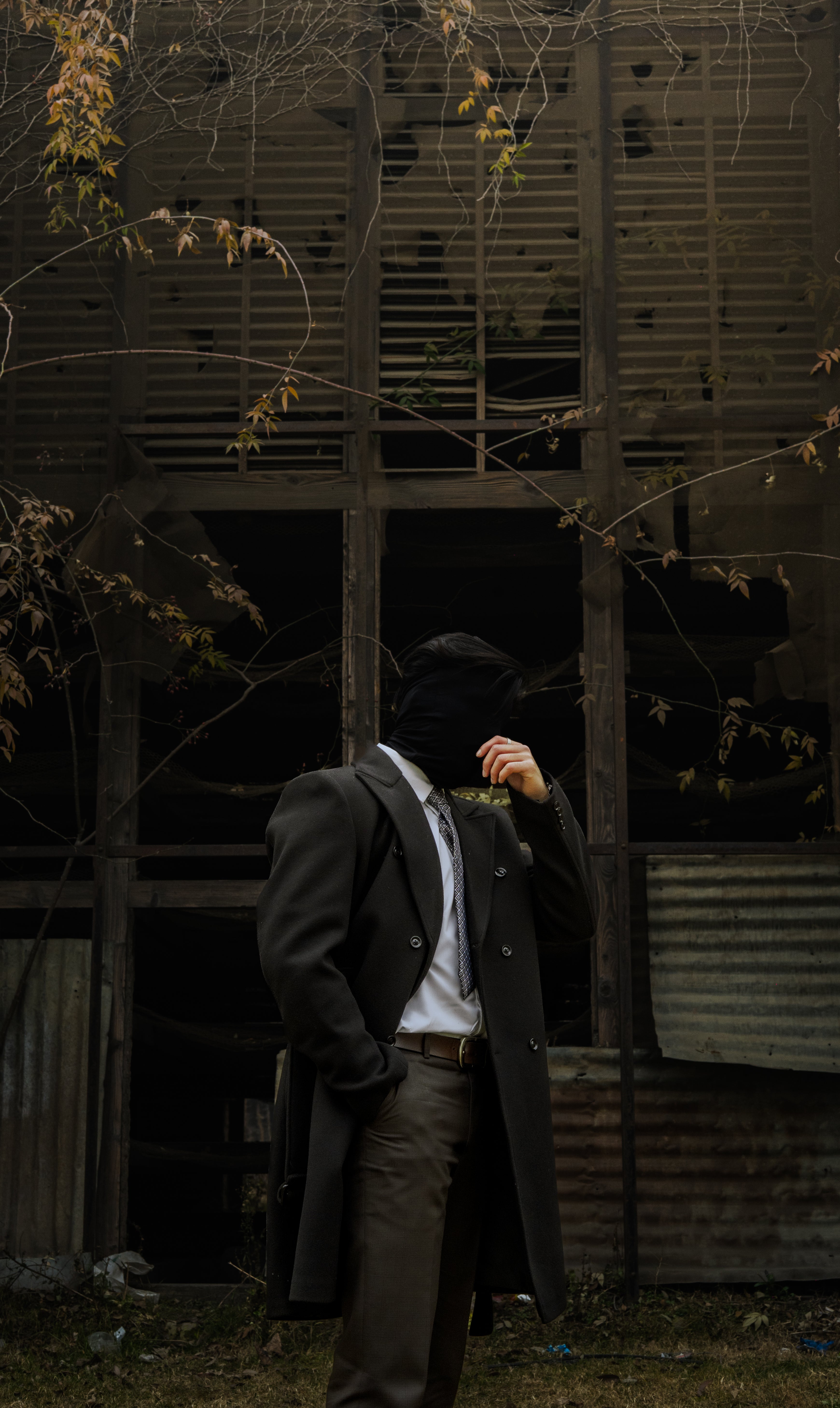 BLACK DOUBLE-BREASTED WOOL OVERCOAT